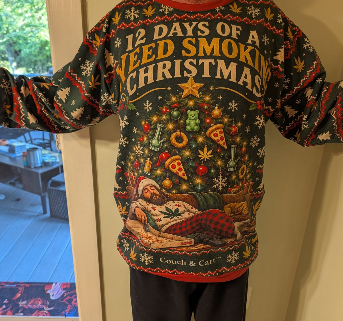 Real photo of the 12 Days of a Weed Smoking Christmas ugly Christmas sweatshirt being worn, front view – Couch & Cart