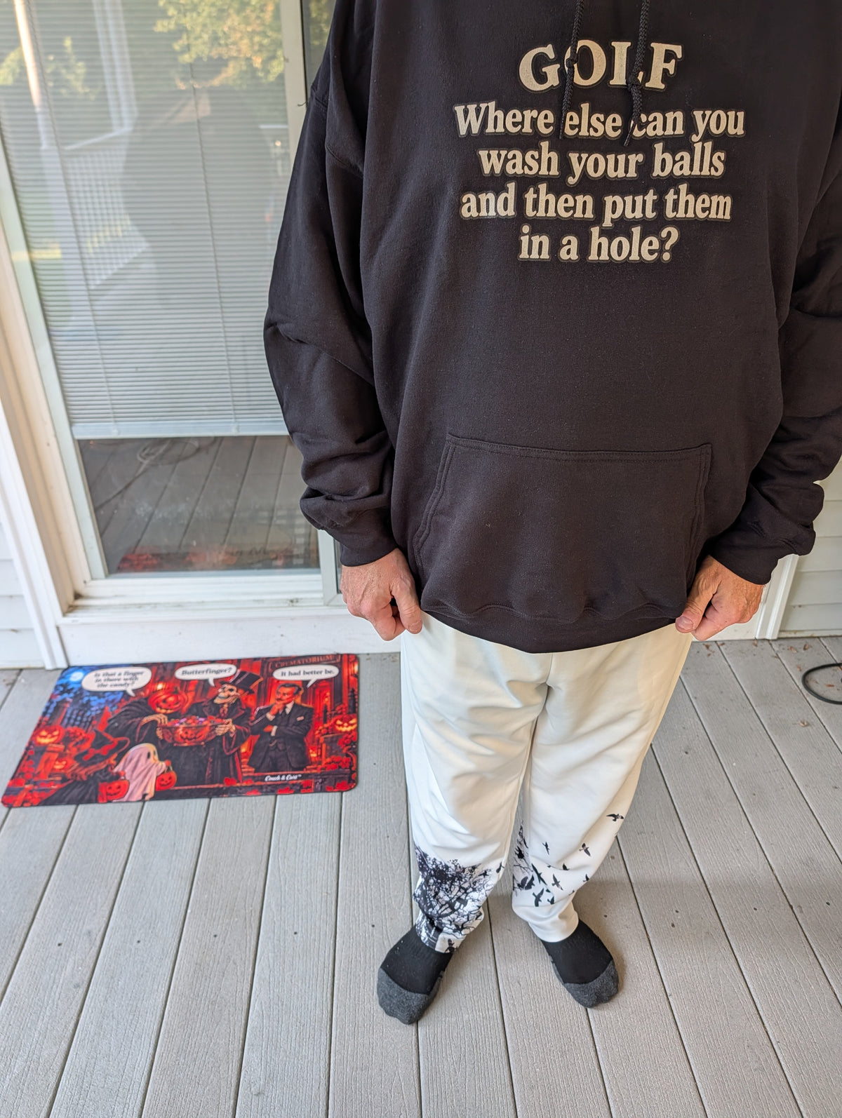 Real photo: front of the black hoodie – GOLF: Where else can you wash your balls and then put them in a hole?